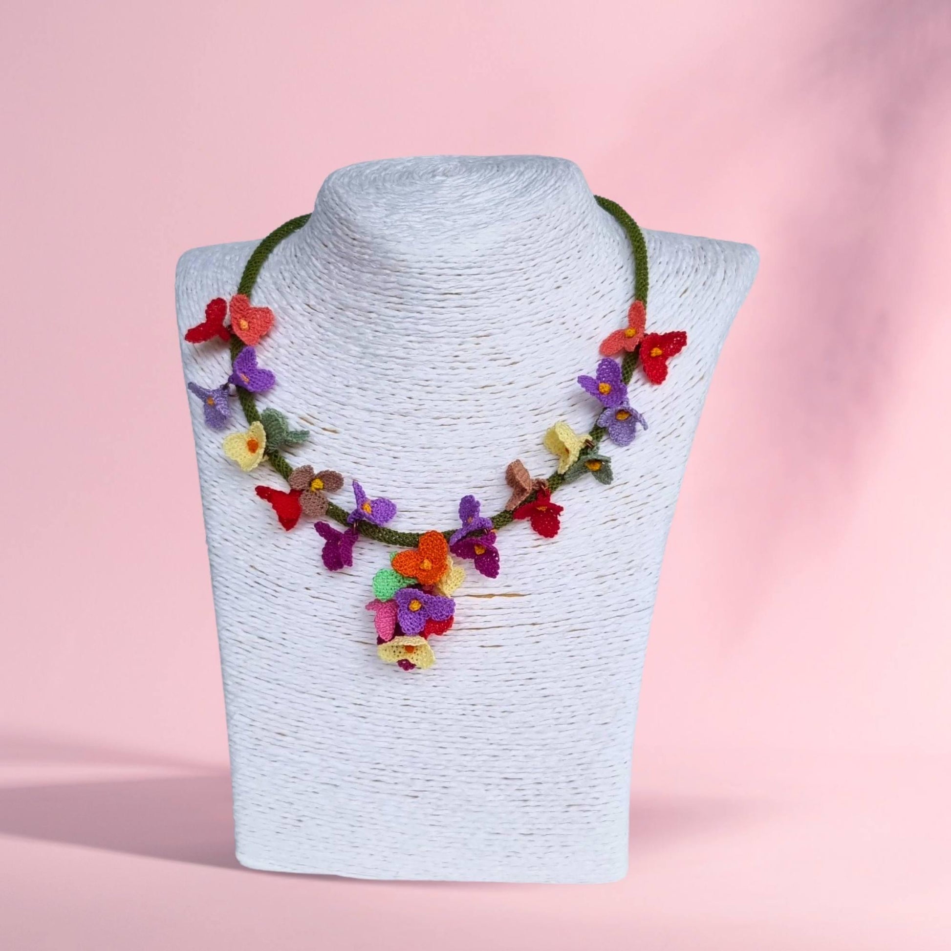 Handmade colorful floral necklace with beaded flower details in boho style