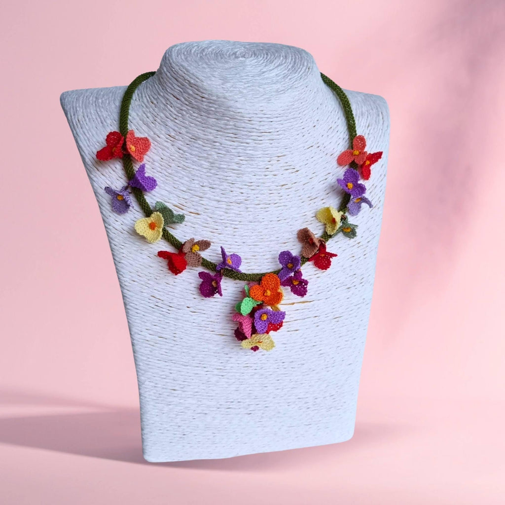Handmade colorful floral necklace with beaded flower details in boho style