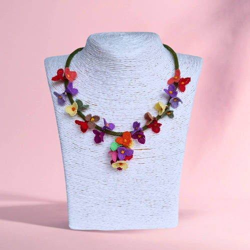 Handmade colorful floral necklace with beaded flower details in boho style